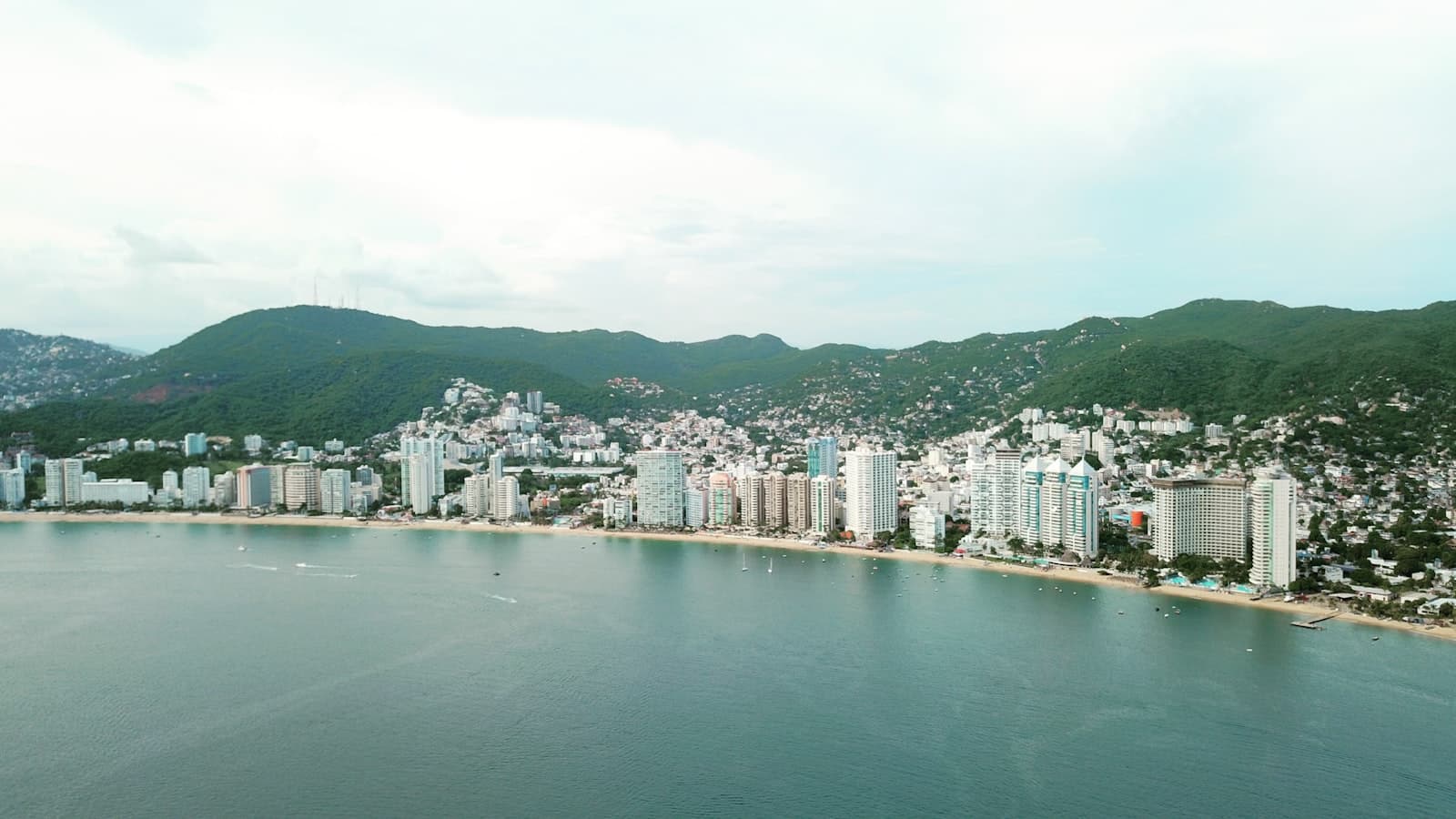 Acapulco — city buildings near body of water during daytime