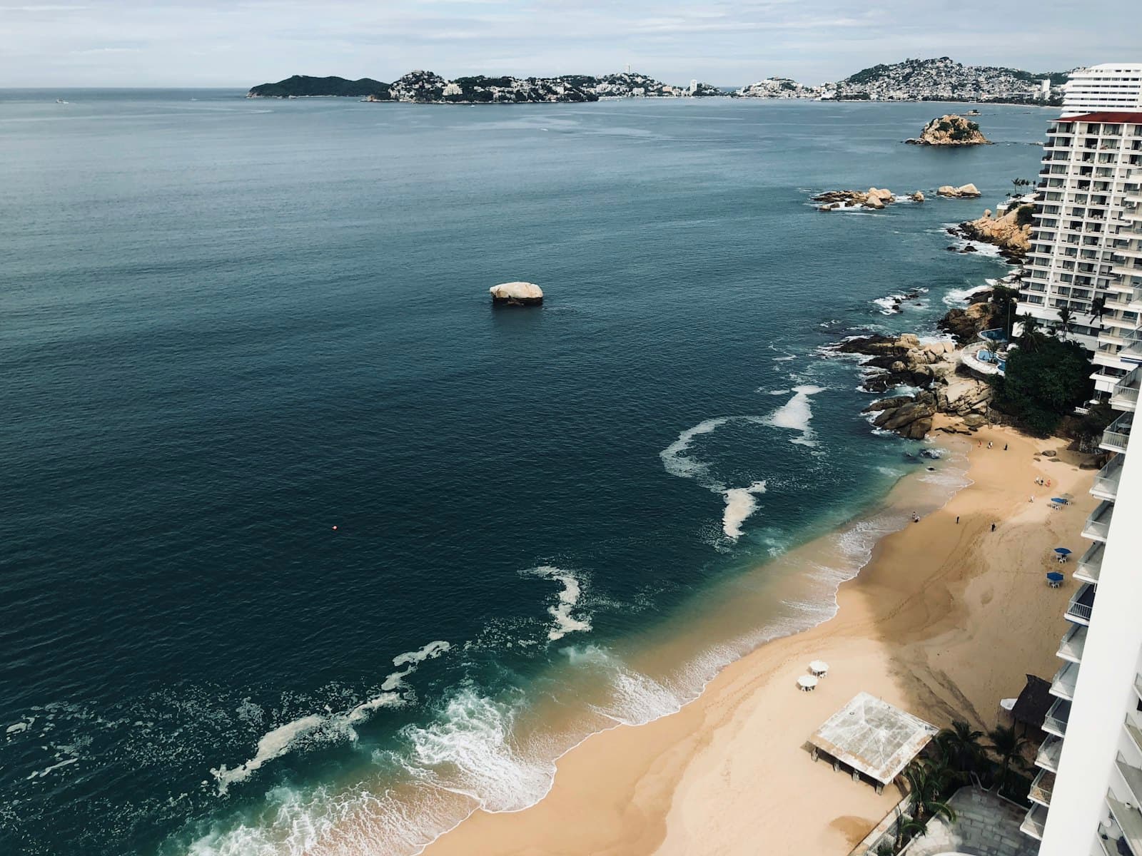 Acapulco — brown sandy beach aerial photo