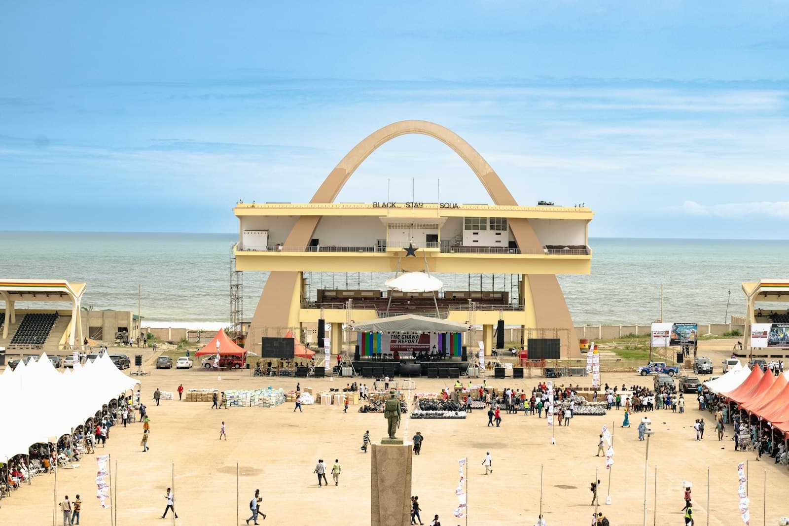 Accra — An aerial view of a beach with tents and people