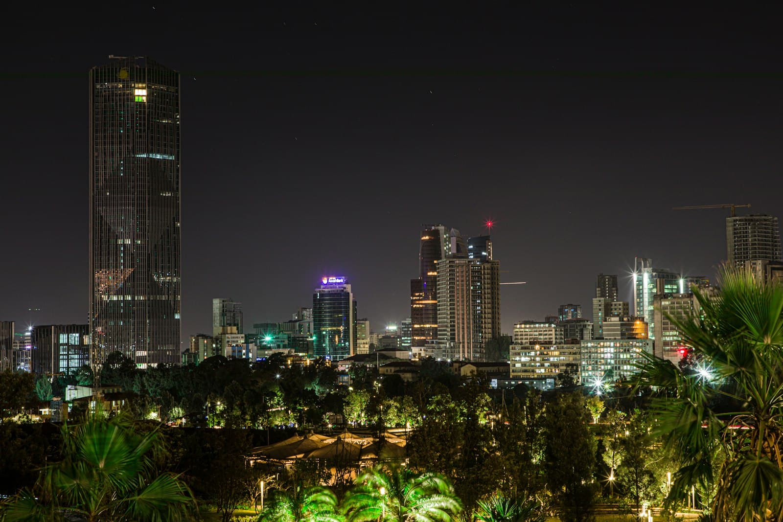 Addis Ababa — a night view of a city with a lot of tall buildings