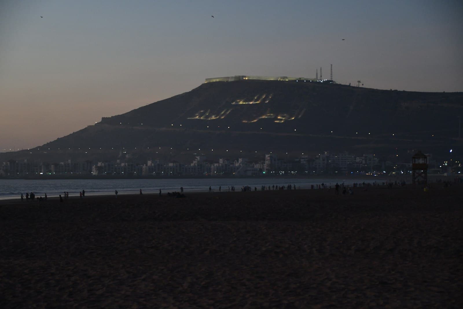 Agadir — a beach with a hill in the background