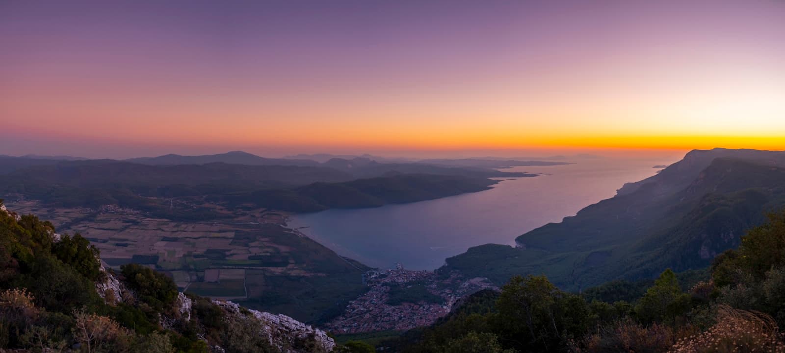Akyaka — a river with a city in the distance