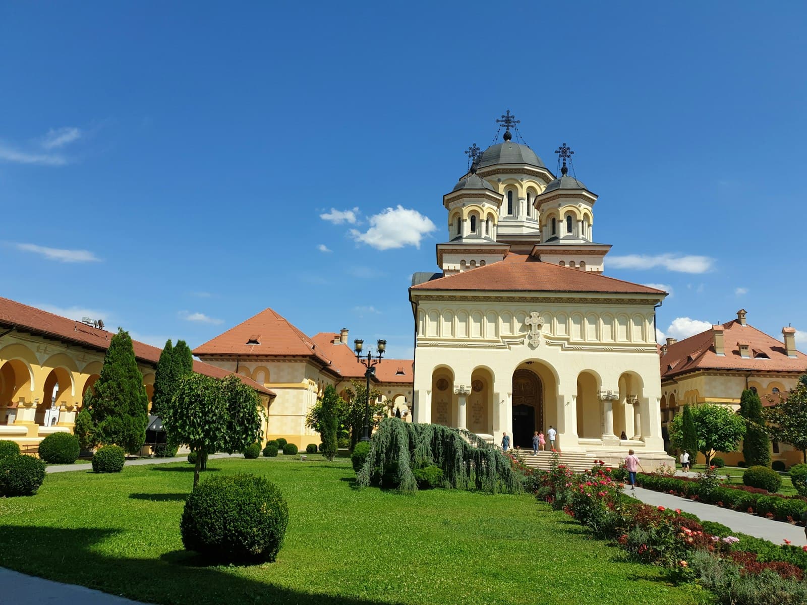 Alba Iulia — brown and white concrete building under blue sky during daytime