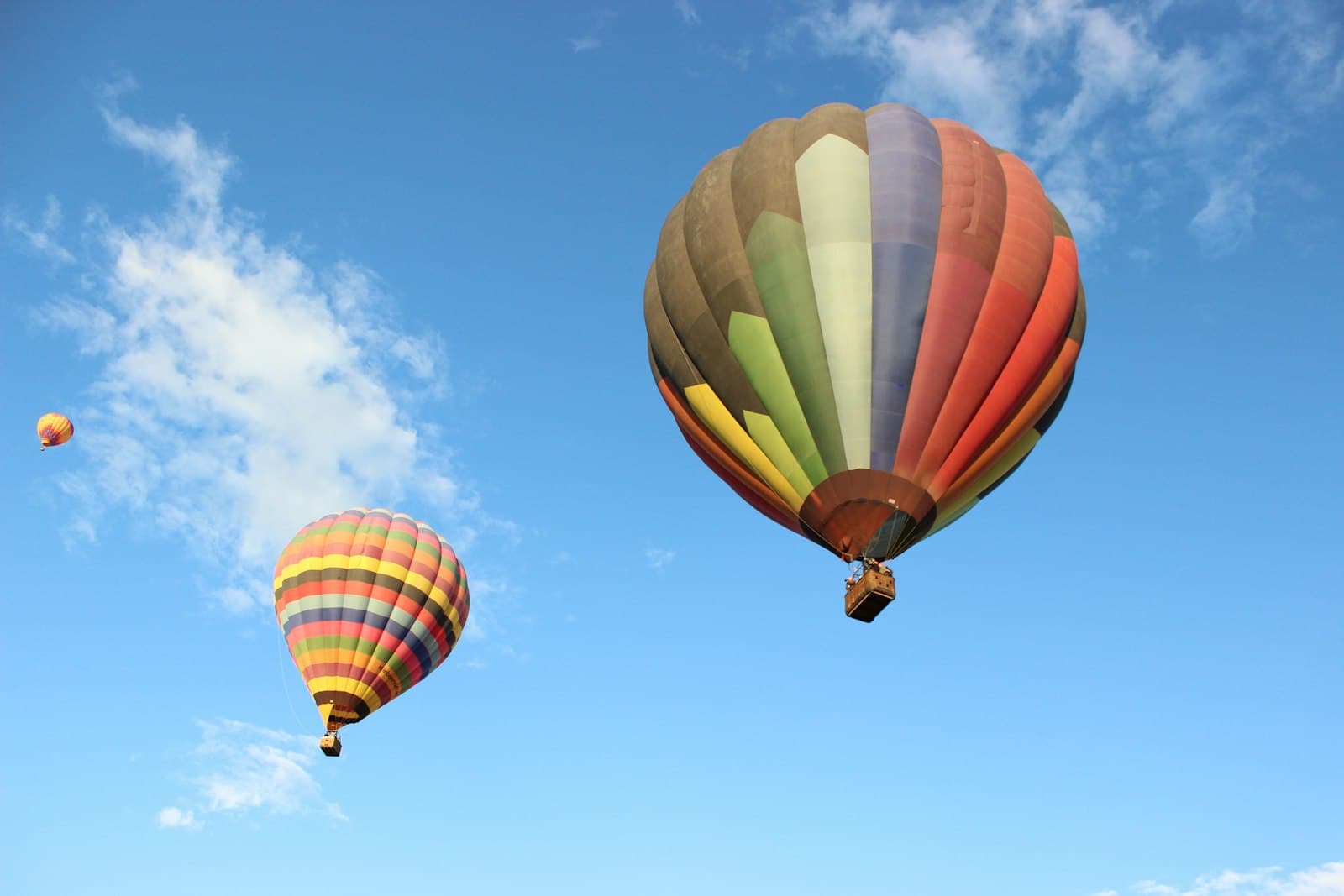 Albuquerque — yellow red and blue hot air balloon under blue sky during daytime