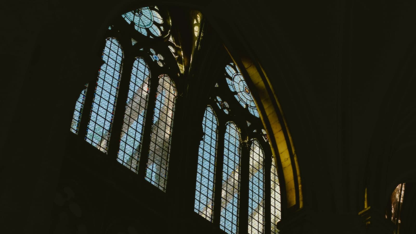 Amiens — Two large windows in a building with a clock