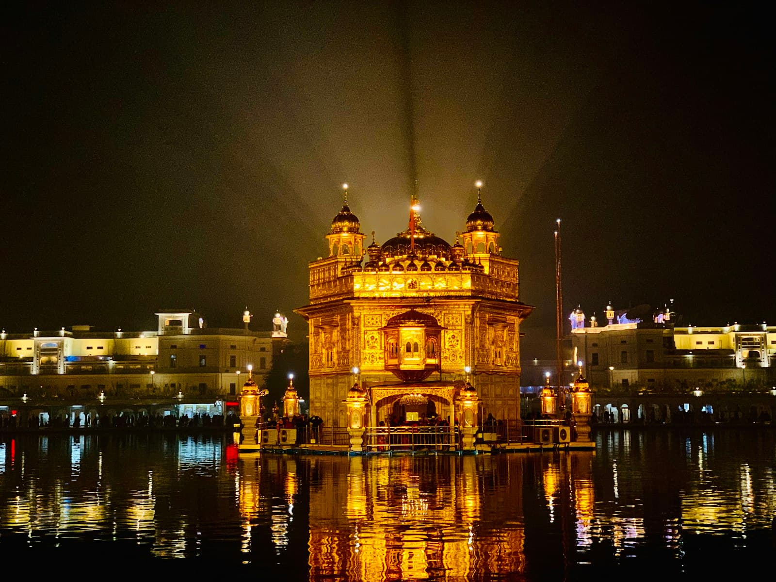 Amritsar — brown concrete building during nighttime