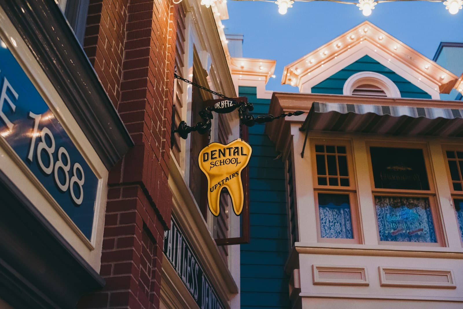 Anaheim — a yellow dental sign hanging from the side of a building