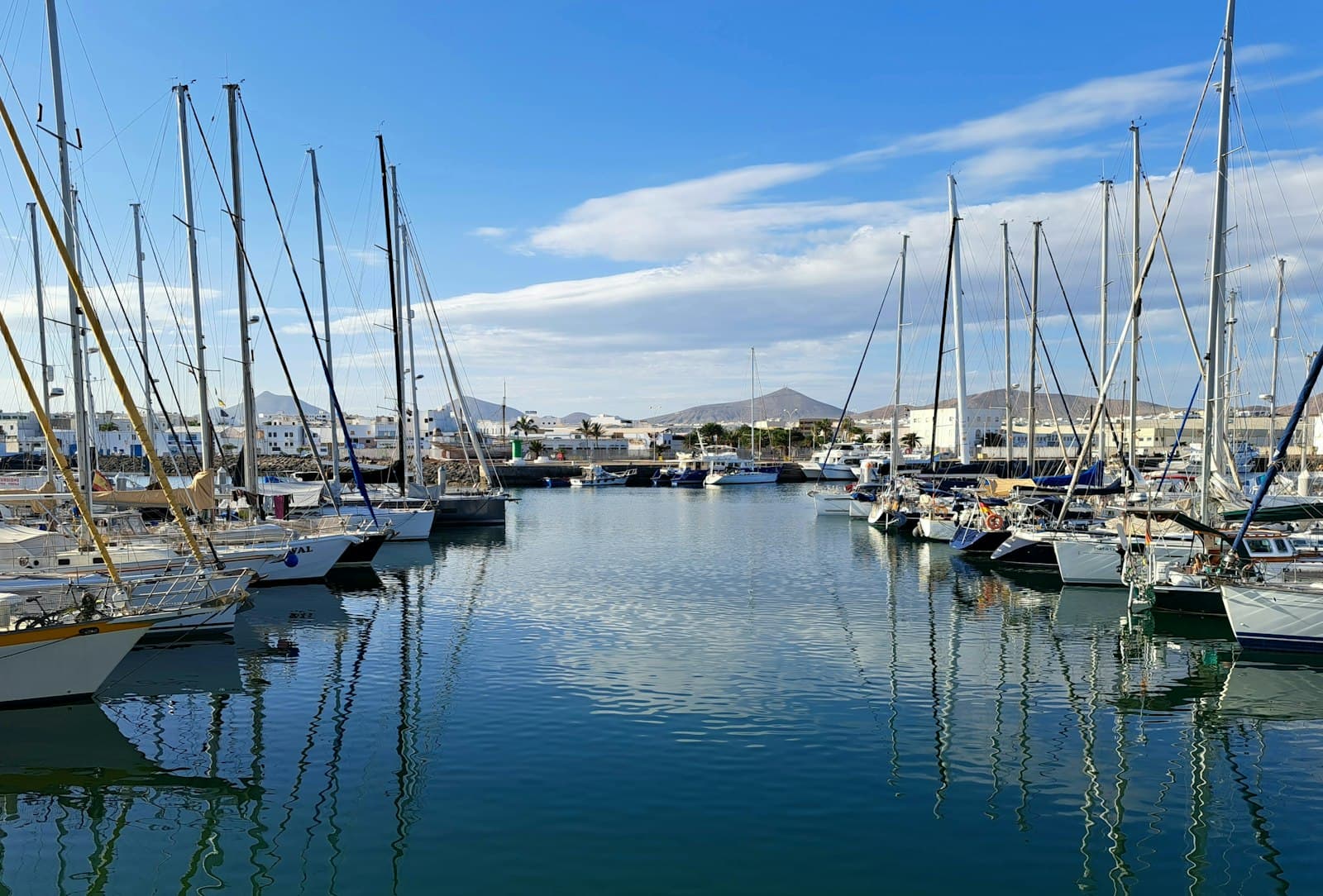 Arrecife — a bunch of boats that are sitting in the water