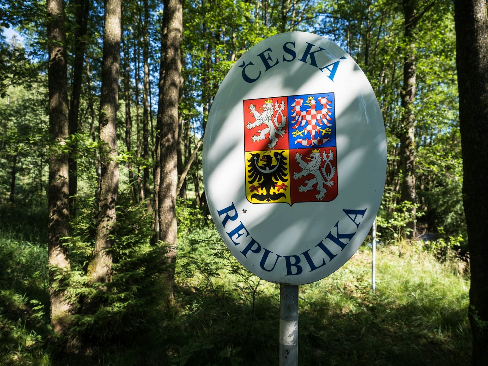 Aš — Czech republic border sign in a forest setting