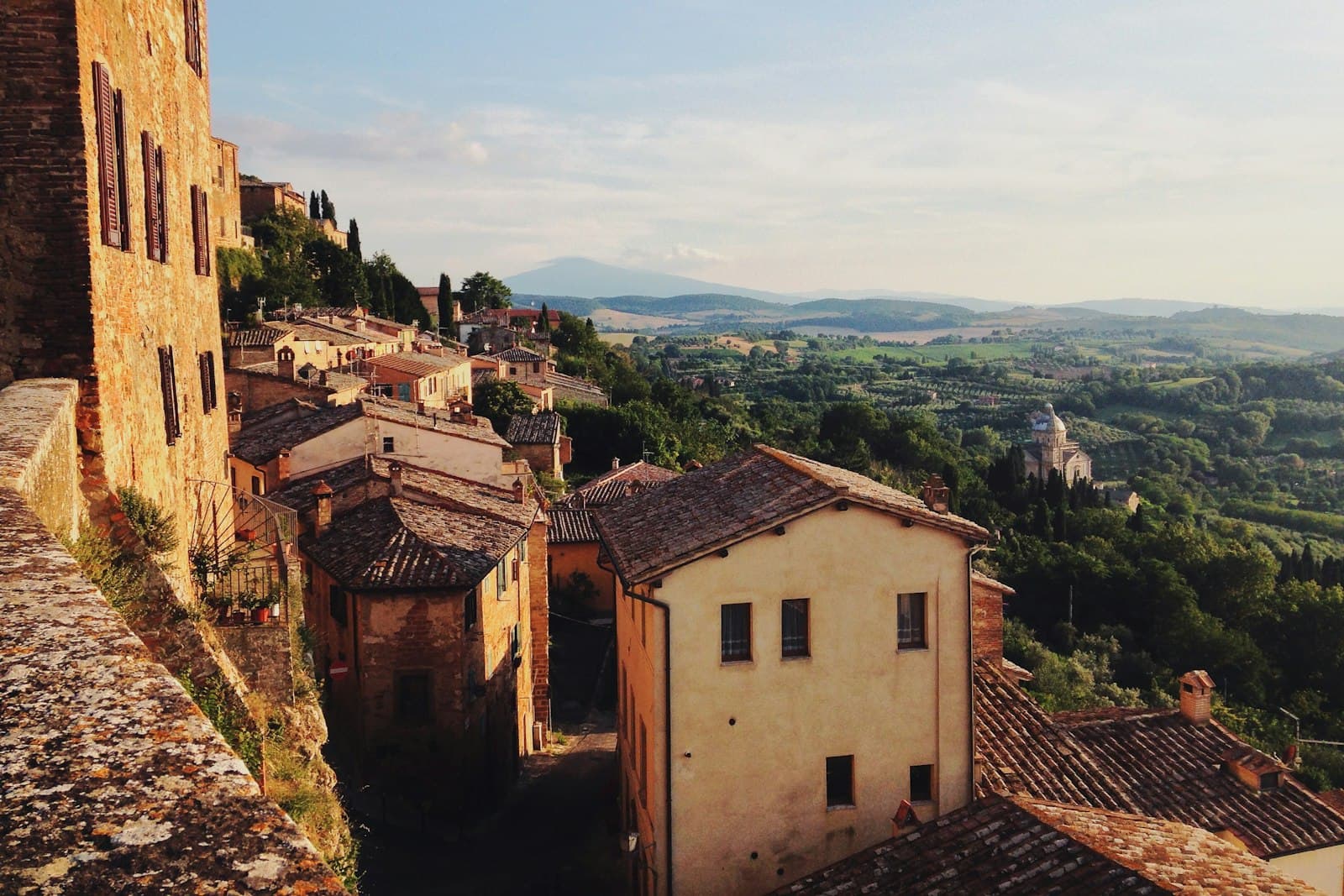 Assisi — brown concrete houses on mountain at daytime