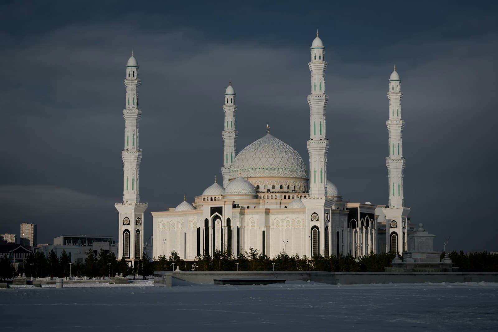 Astana — a large white building with two towers on top of it