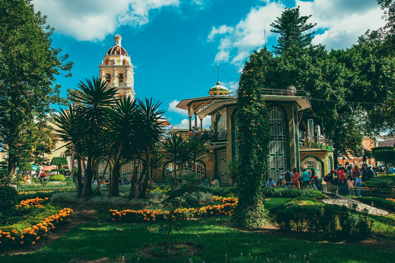 Atlixco — a building with a dome and trees in front of it