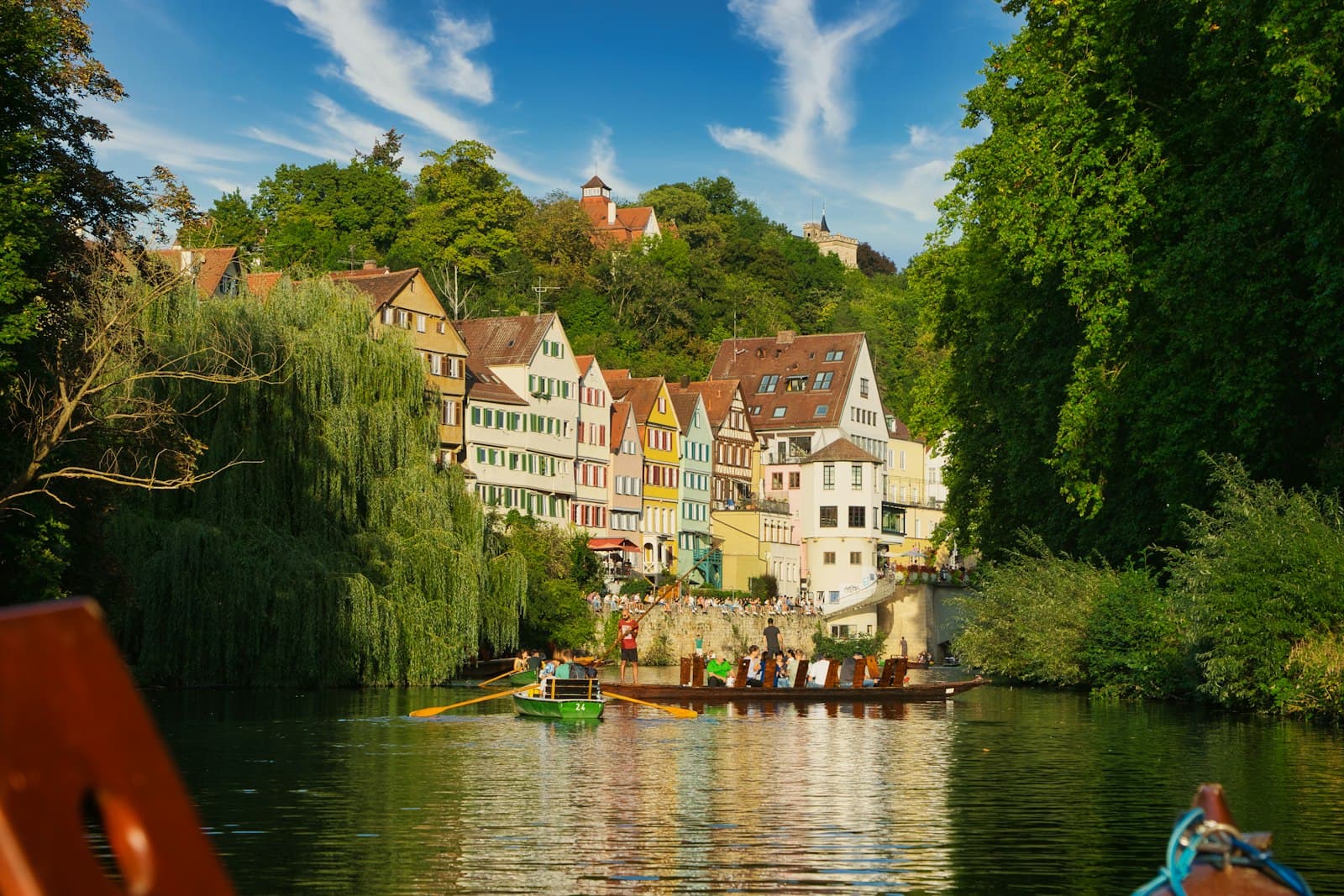 Bad Kreuznach — a row boat on a river with a row of houses in the background