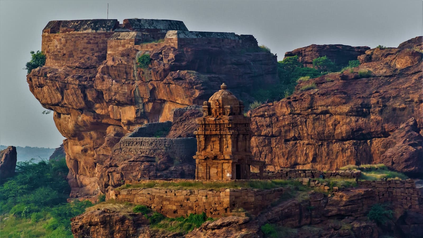 Badami — brown concrete building on top of mountain