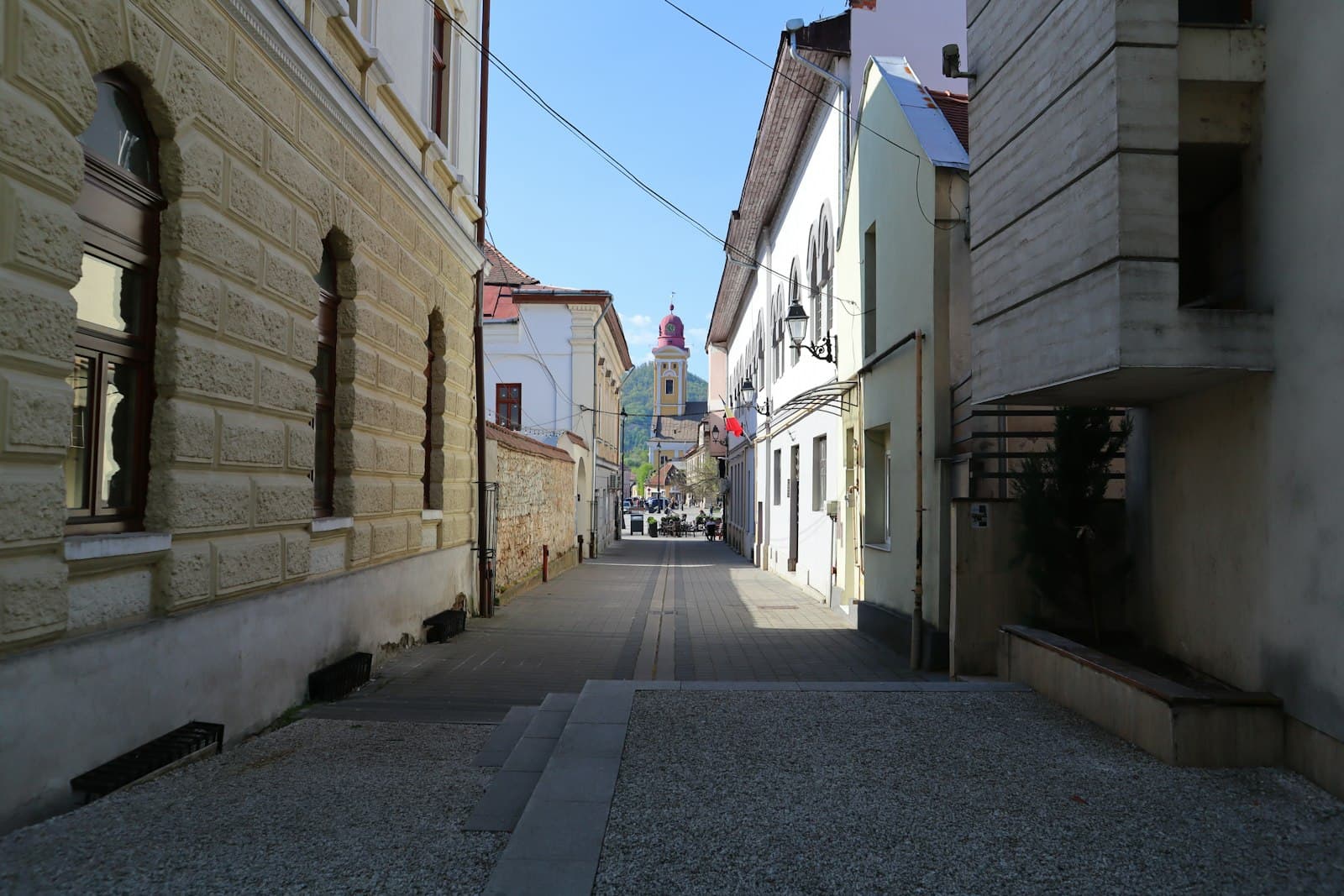 Baia Mare — a narrow street with buildings on both sides