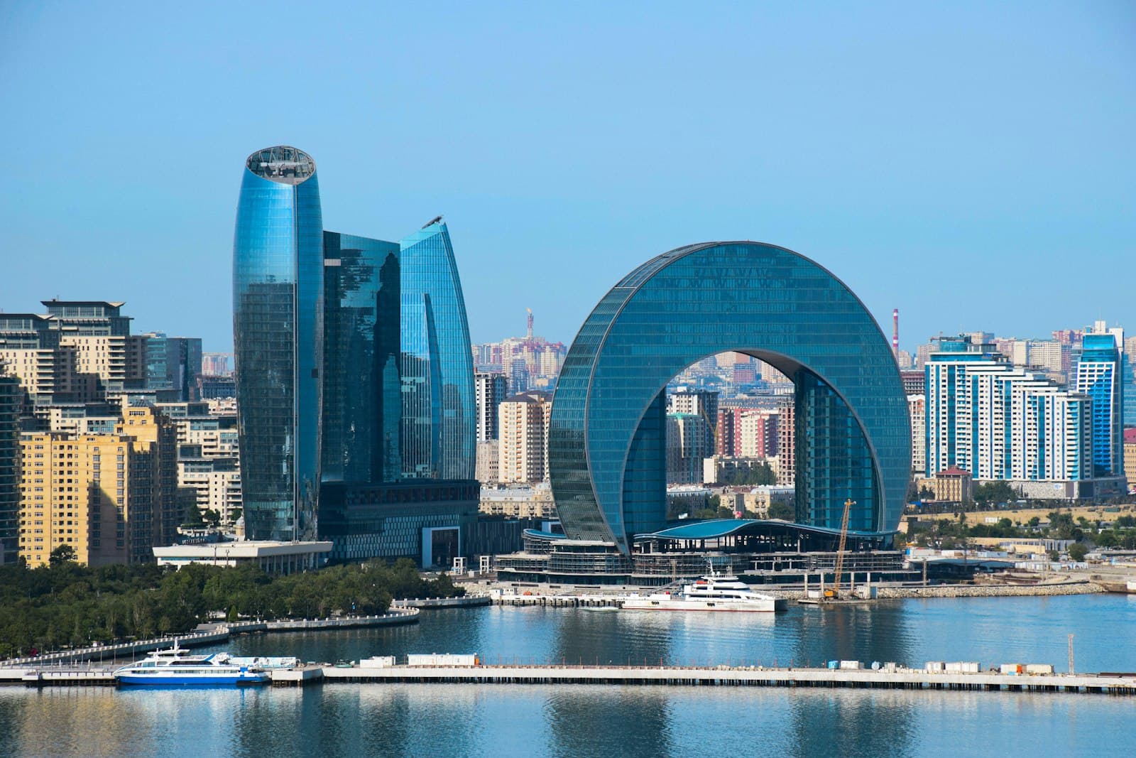 Baku — a large body of water with a city in the background