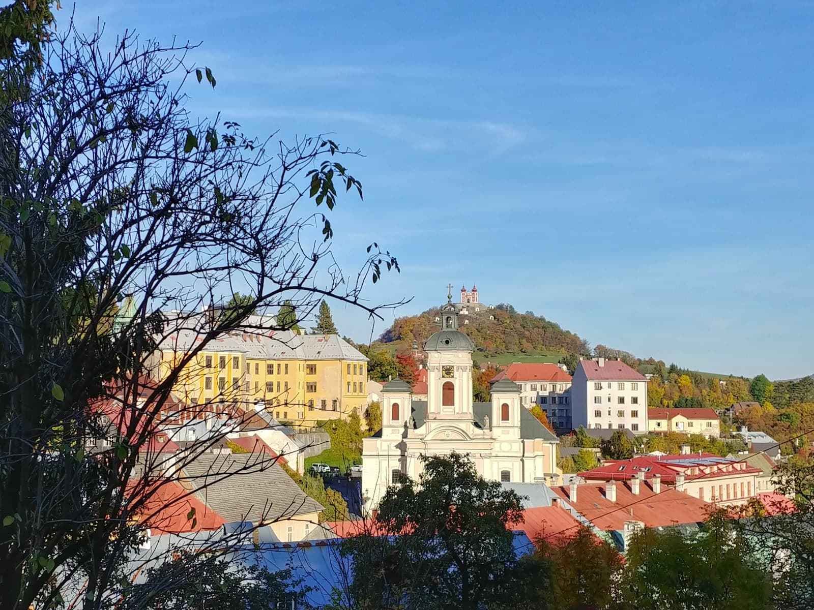 Banská Štiavnica — a view of a town with a church on a hill