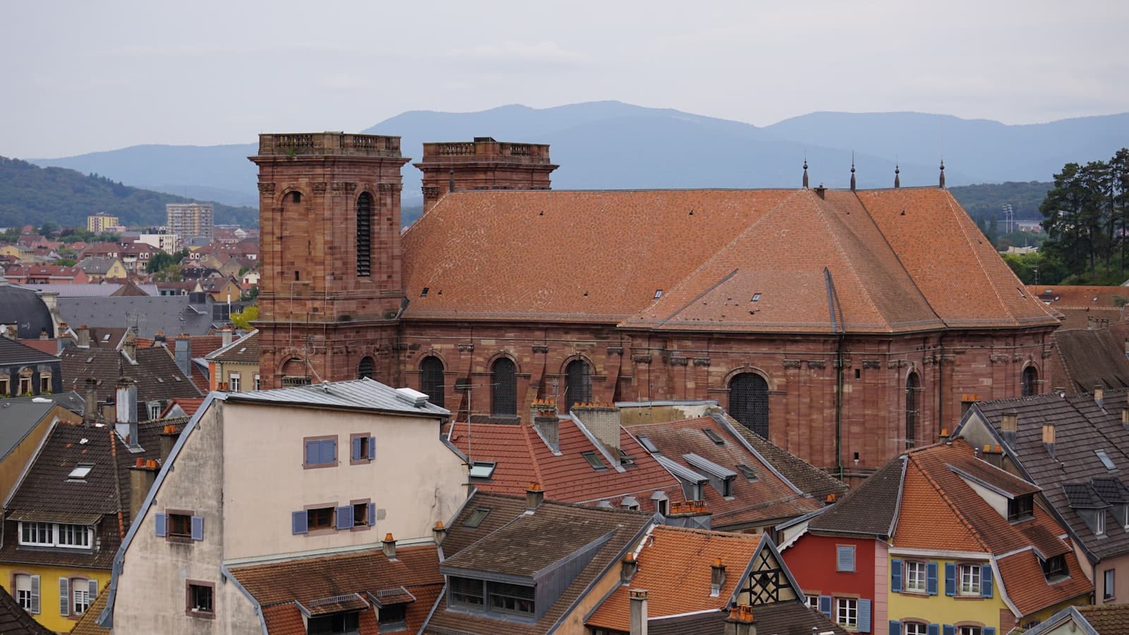 Belfort — A view of a city with a church in the background