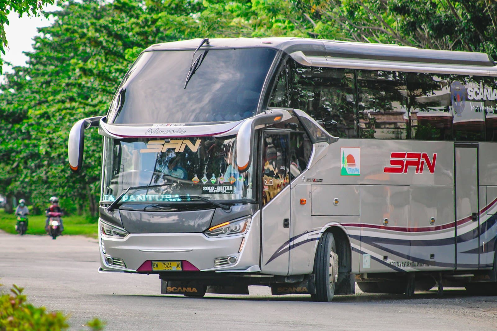 Bengkulu — white and black bus on road during daytime