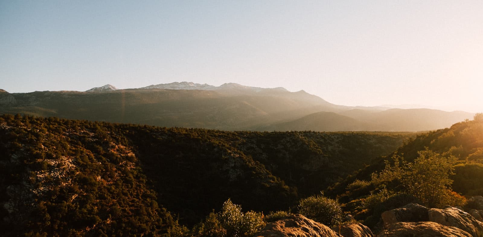 Béni Mellal — a view of a mountain range with the sun setting