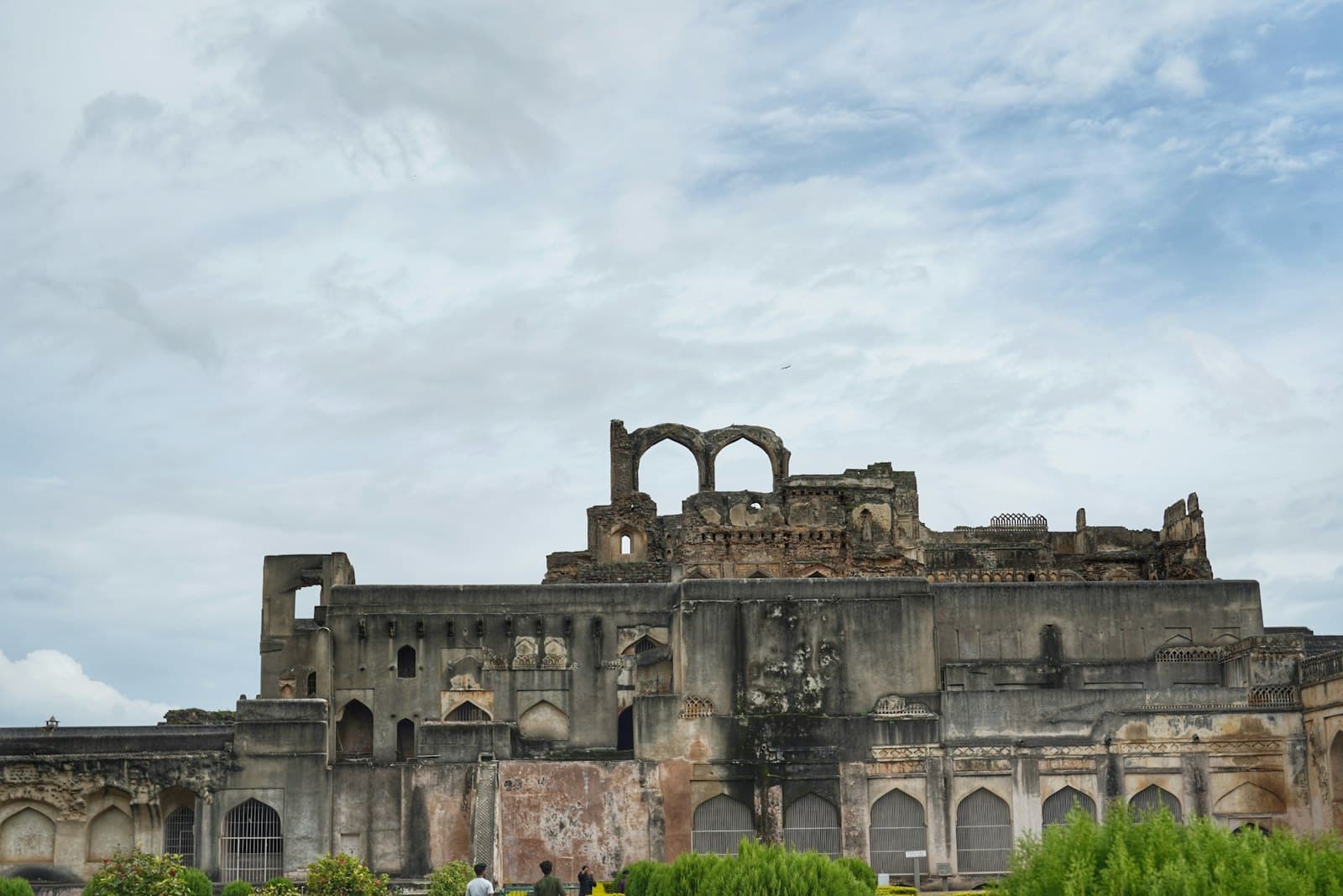 Bidar — A large building with a bunch of trees in front of it