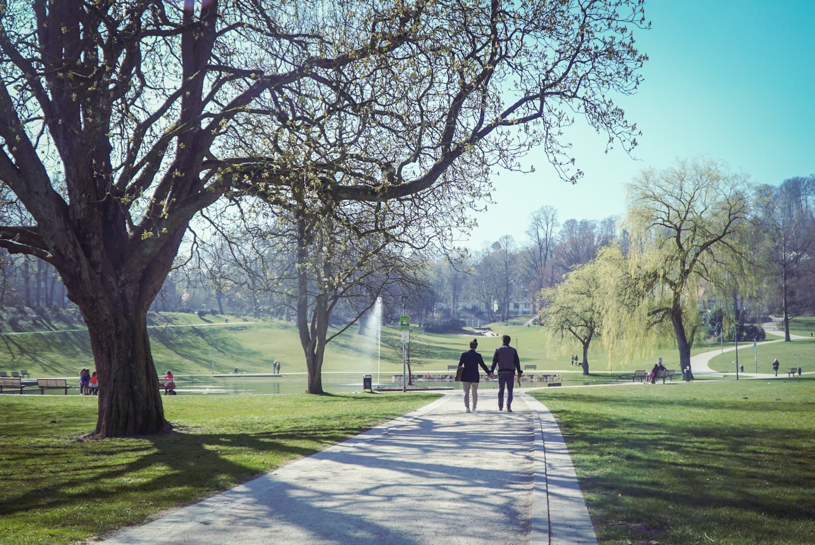 Bielefeld — two people walking down a path in a park