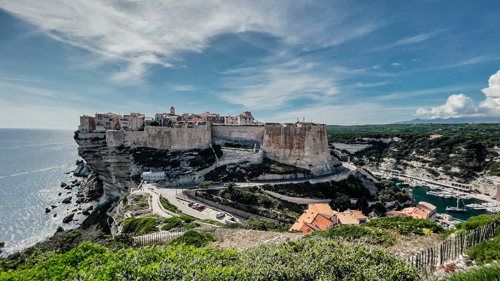 Bonifacio — a scenic view of a city on the edge of a cliff