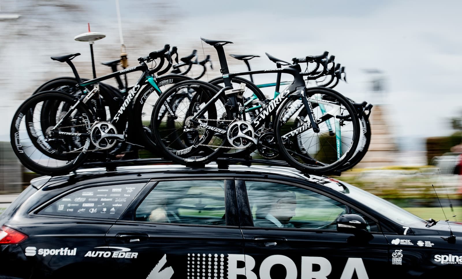 Bora-Bora — road bikes on top of black SUV