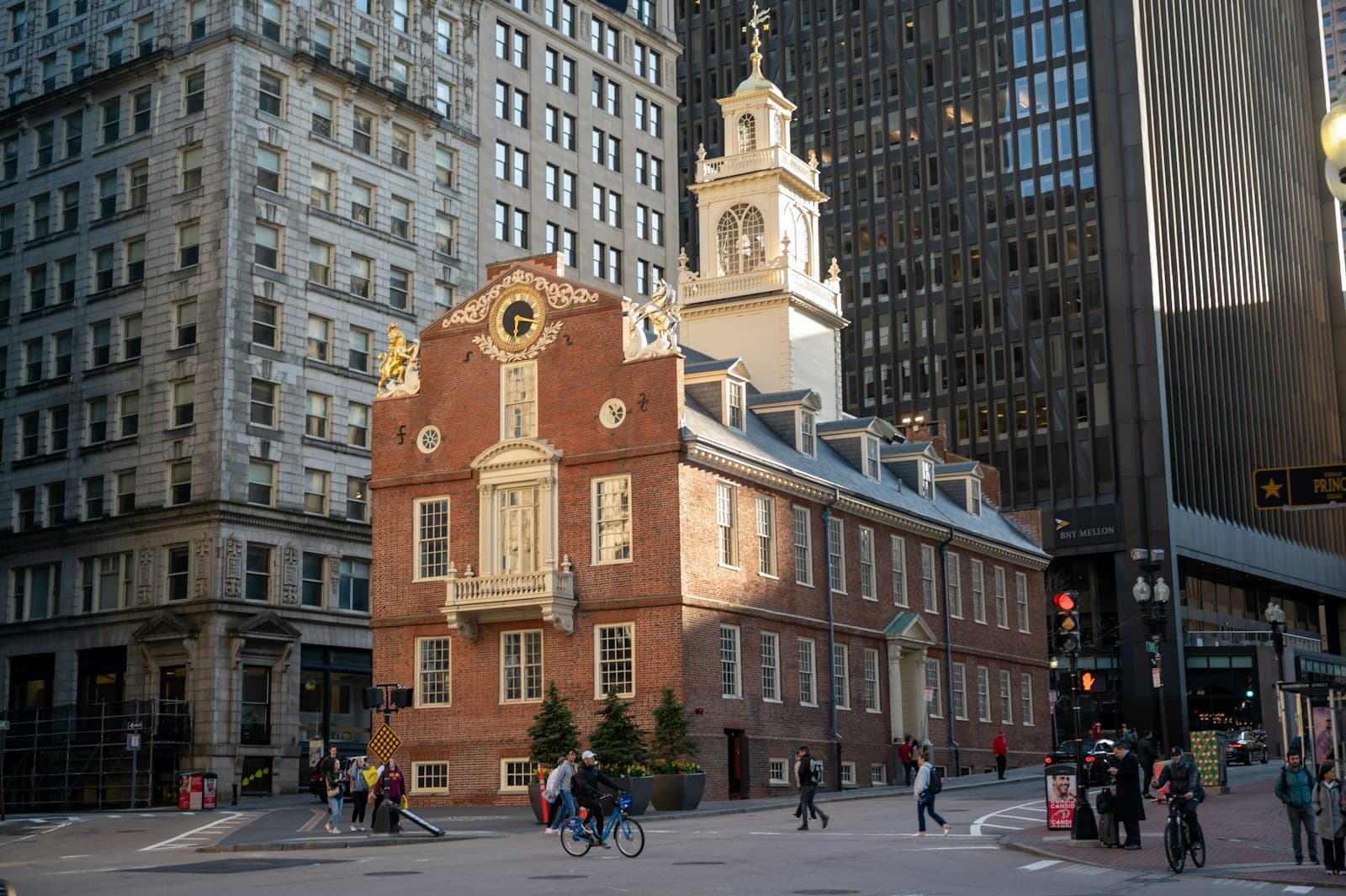Boston's Freedom Trail — a brick building with a clock tower with Old State House in the background