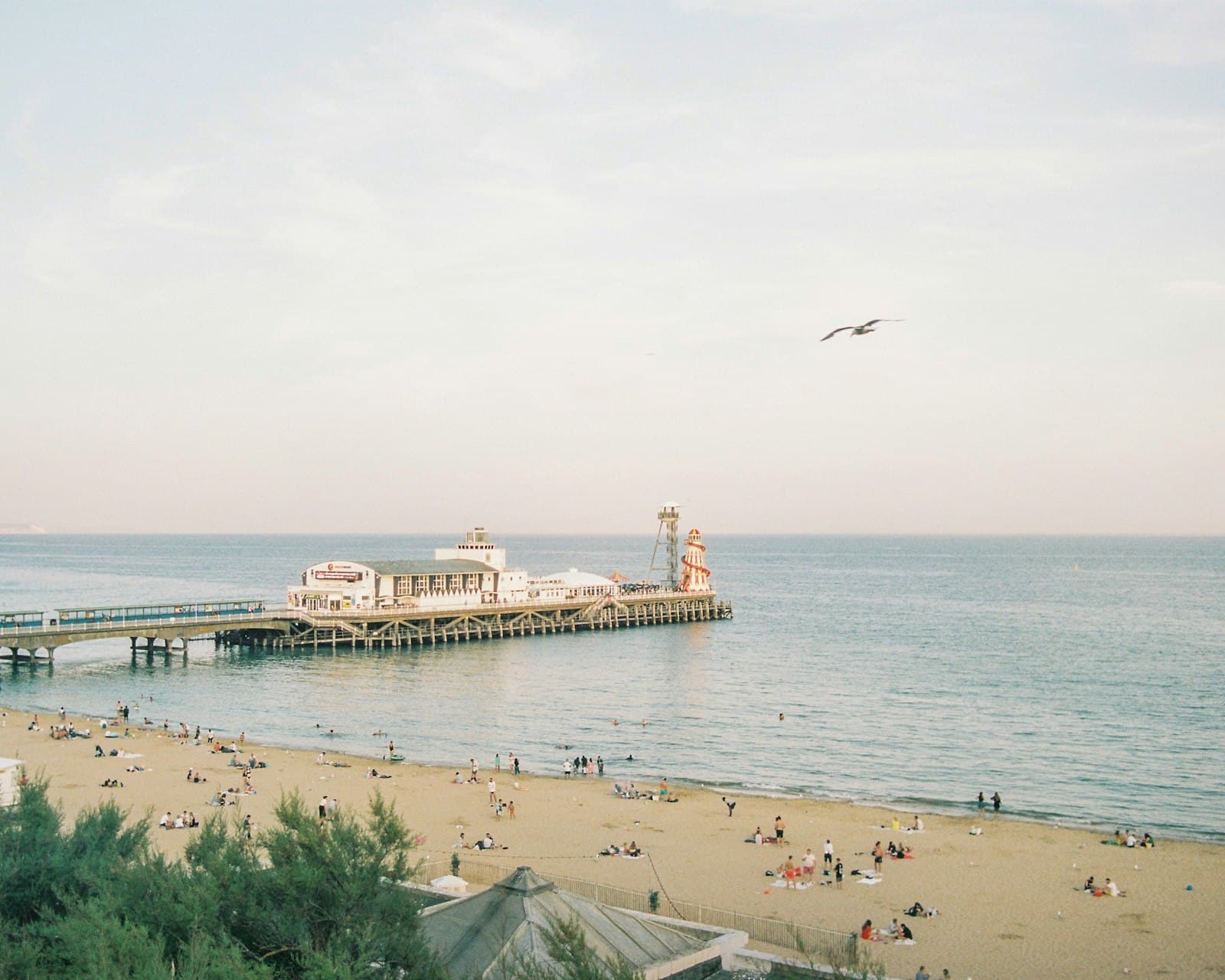 Bournemouth — a pier with people on it and a large body of water in the background