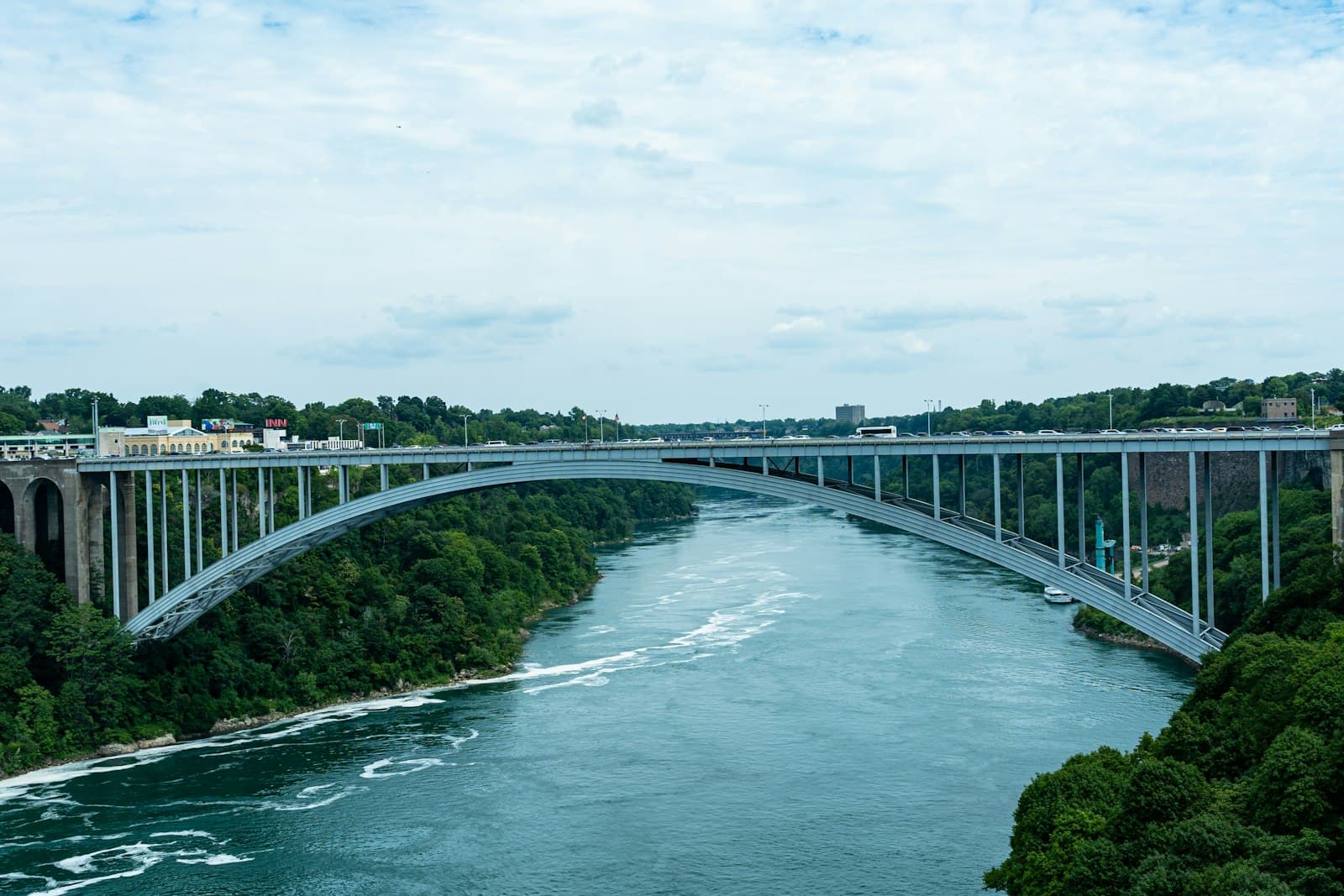 Breaux Bridge — A large arch bridge spans a wide river.