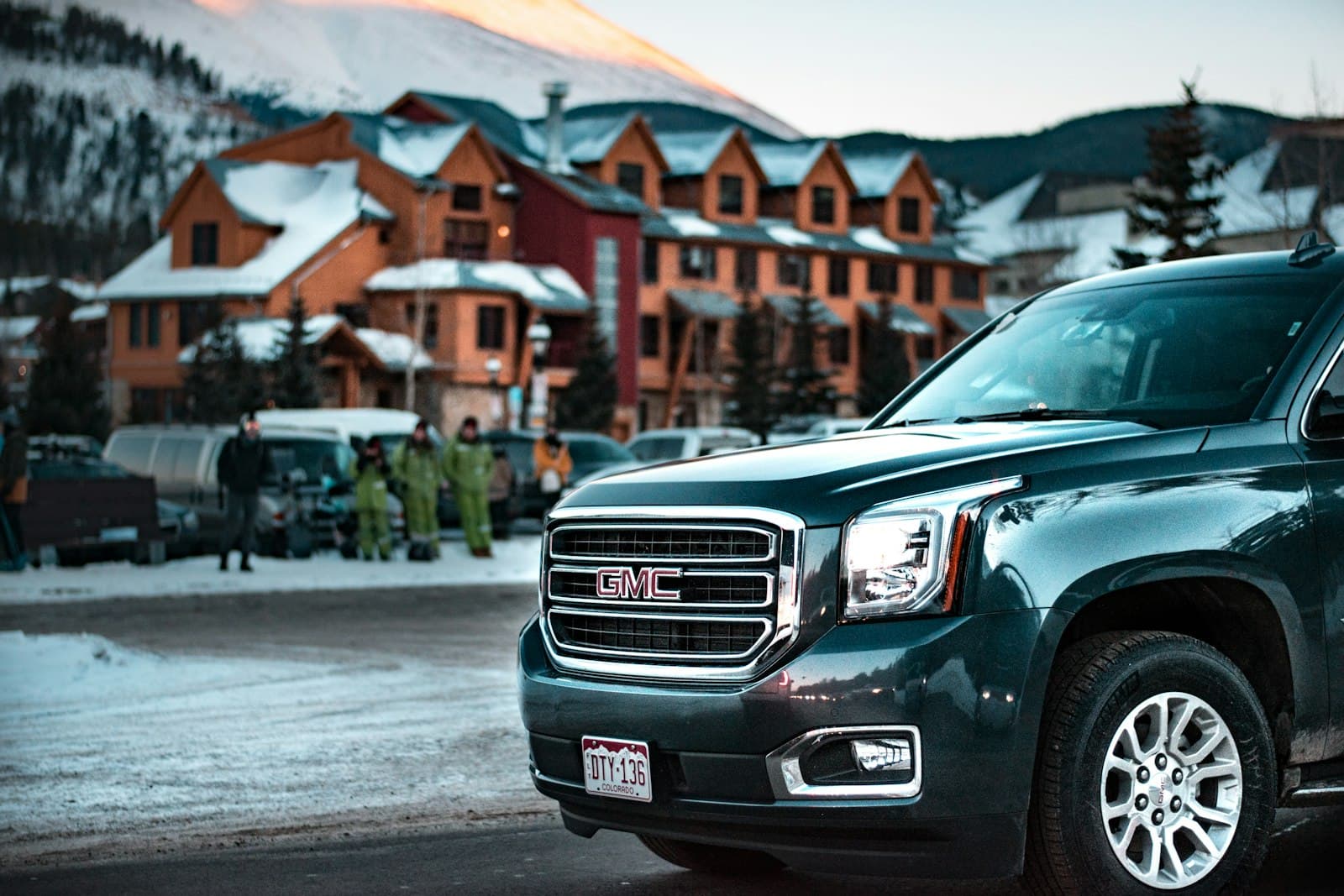 Breckenridge — black GMC SUV near brown houses