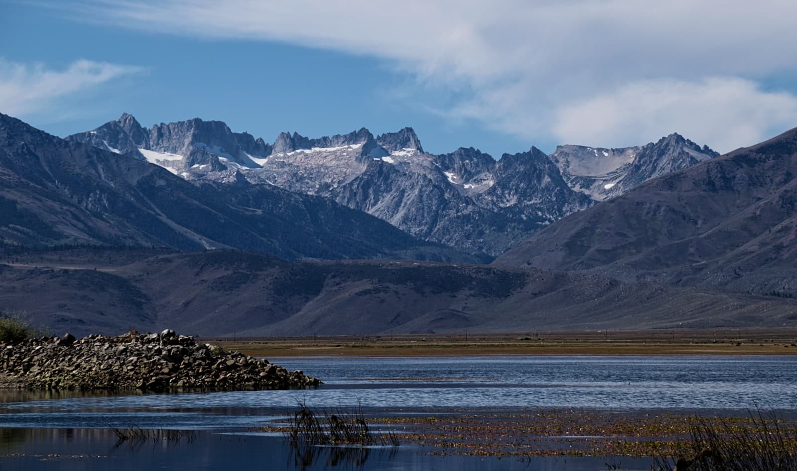 Bridgeport — snow covered mountains under cloudy sky
