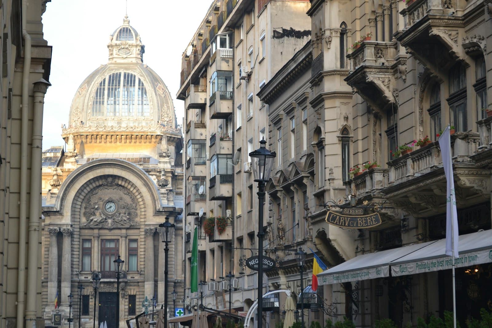 Bucharest — a city street filled with lots of tall buildings