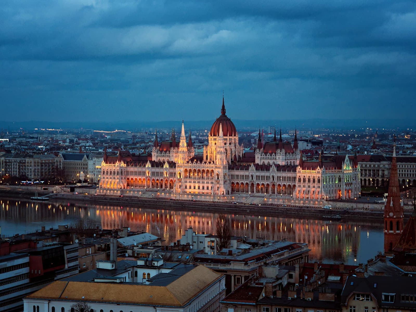 Budapest — brown and white concrete building during night time