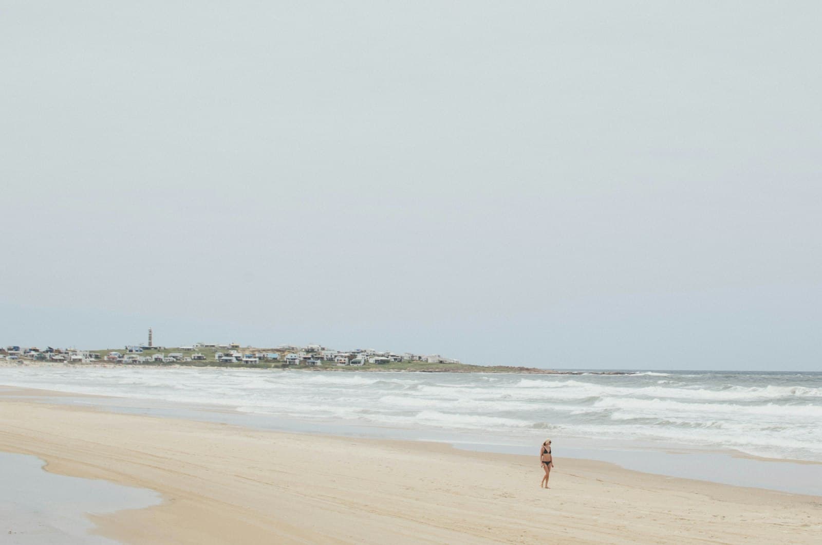 Cabo Polonio — person walking near seashore during daytime