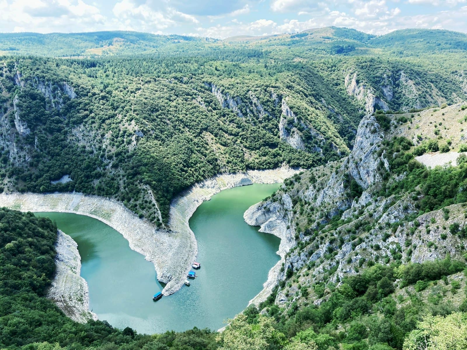 Čačak — a river with a waterfall and trees