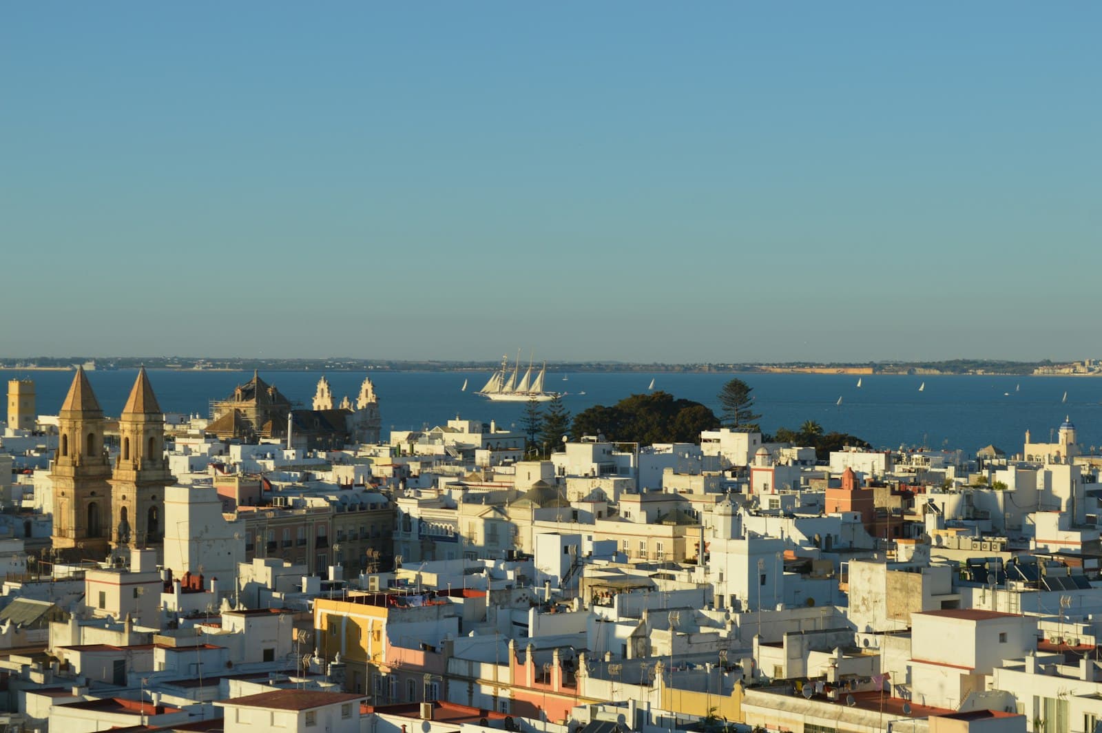 Cádiz — a view of a city with a large body of water in the background
