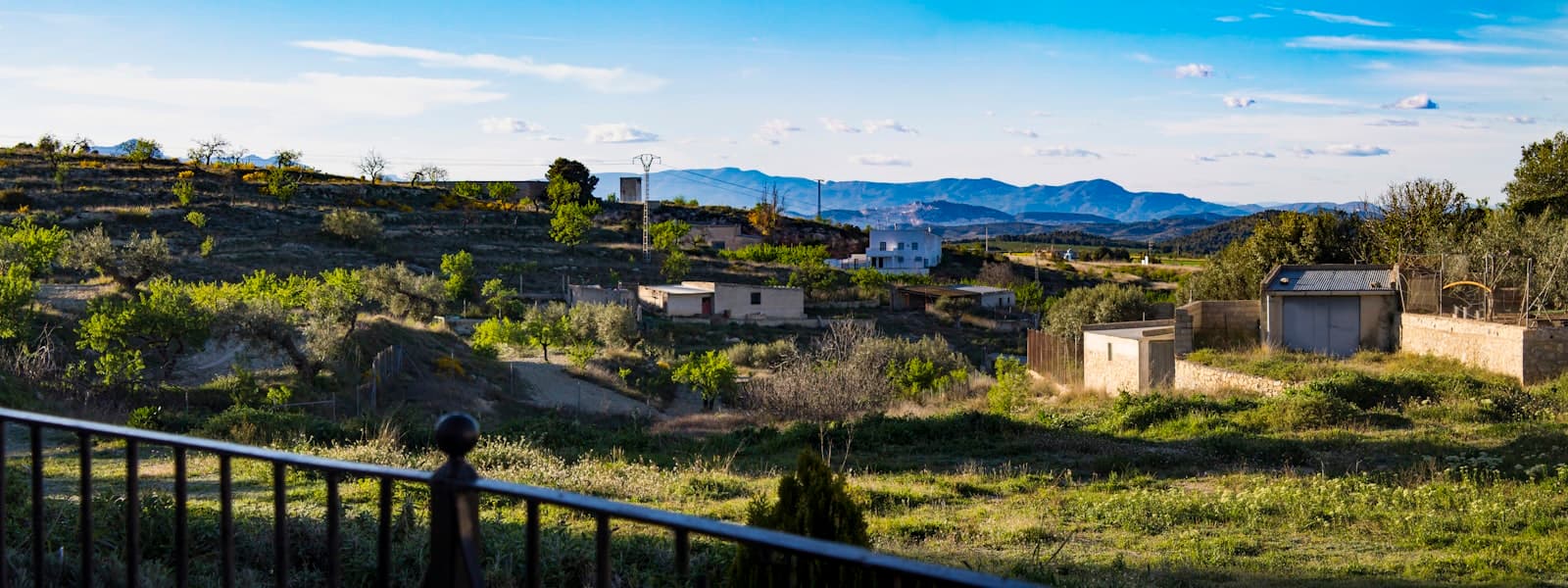 Caravaca de la Cruz — white and brown houses on green grass field during daytime