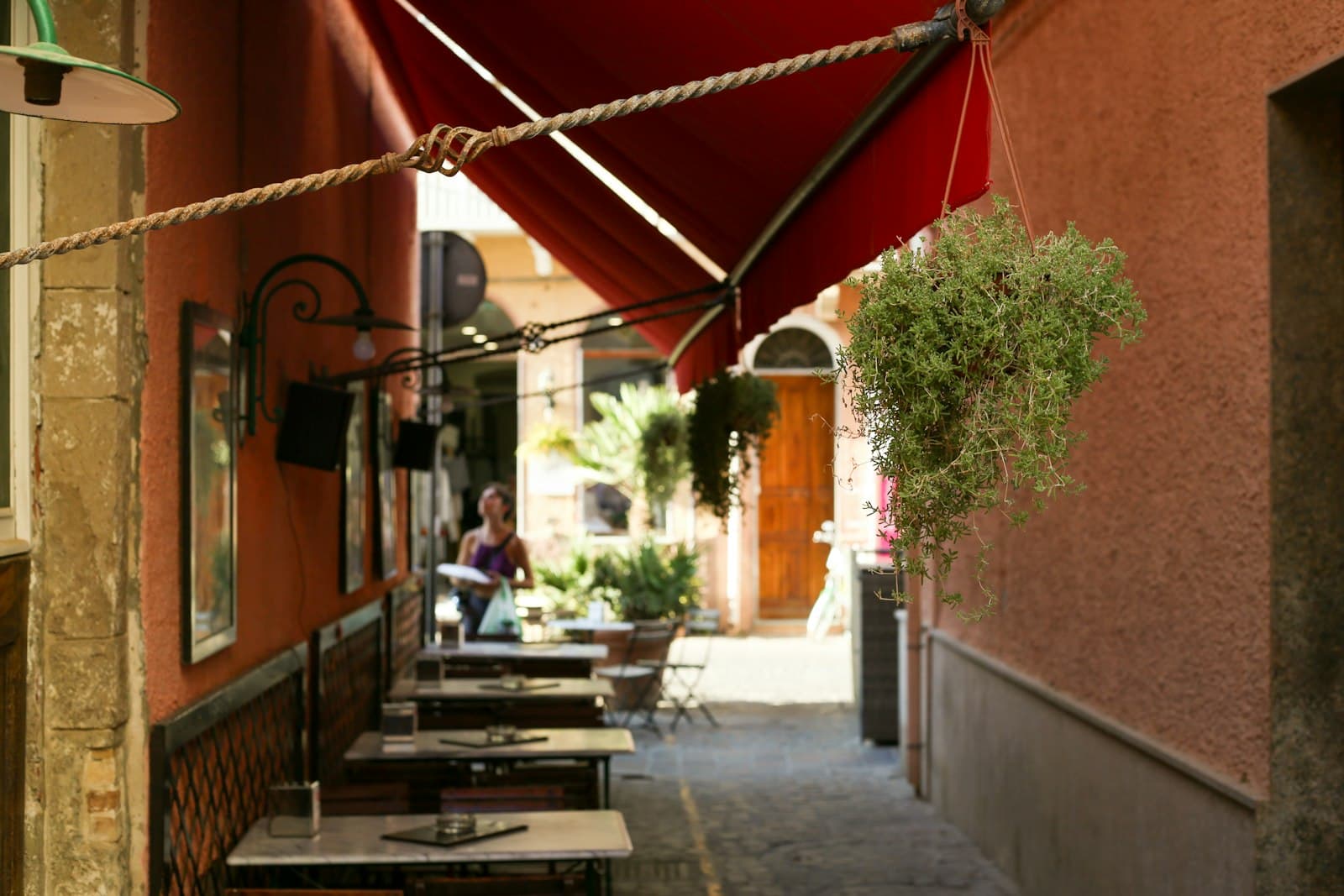 Carloforte — a person sitting on a bench