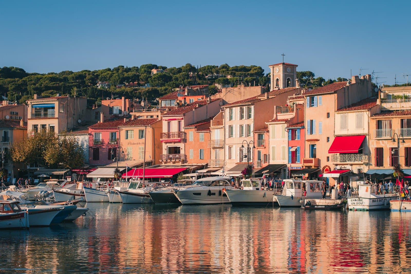 Cassis — a harbor filled with lots of boats next to tall buildings