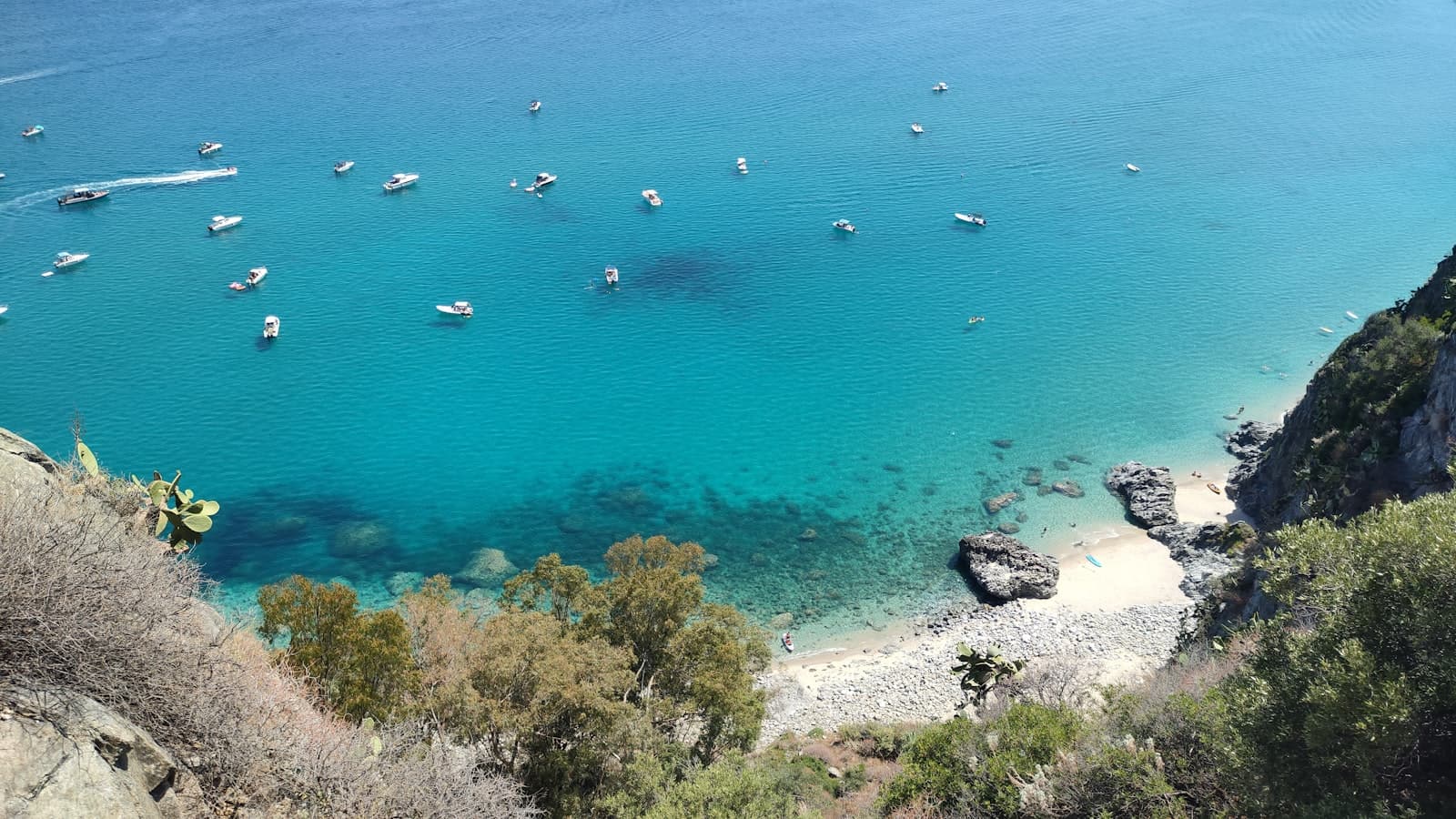 Catanzaro — a group of boats floating on top of a body of water