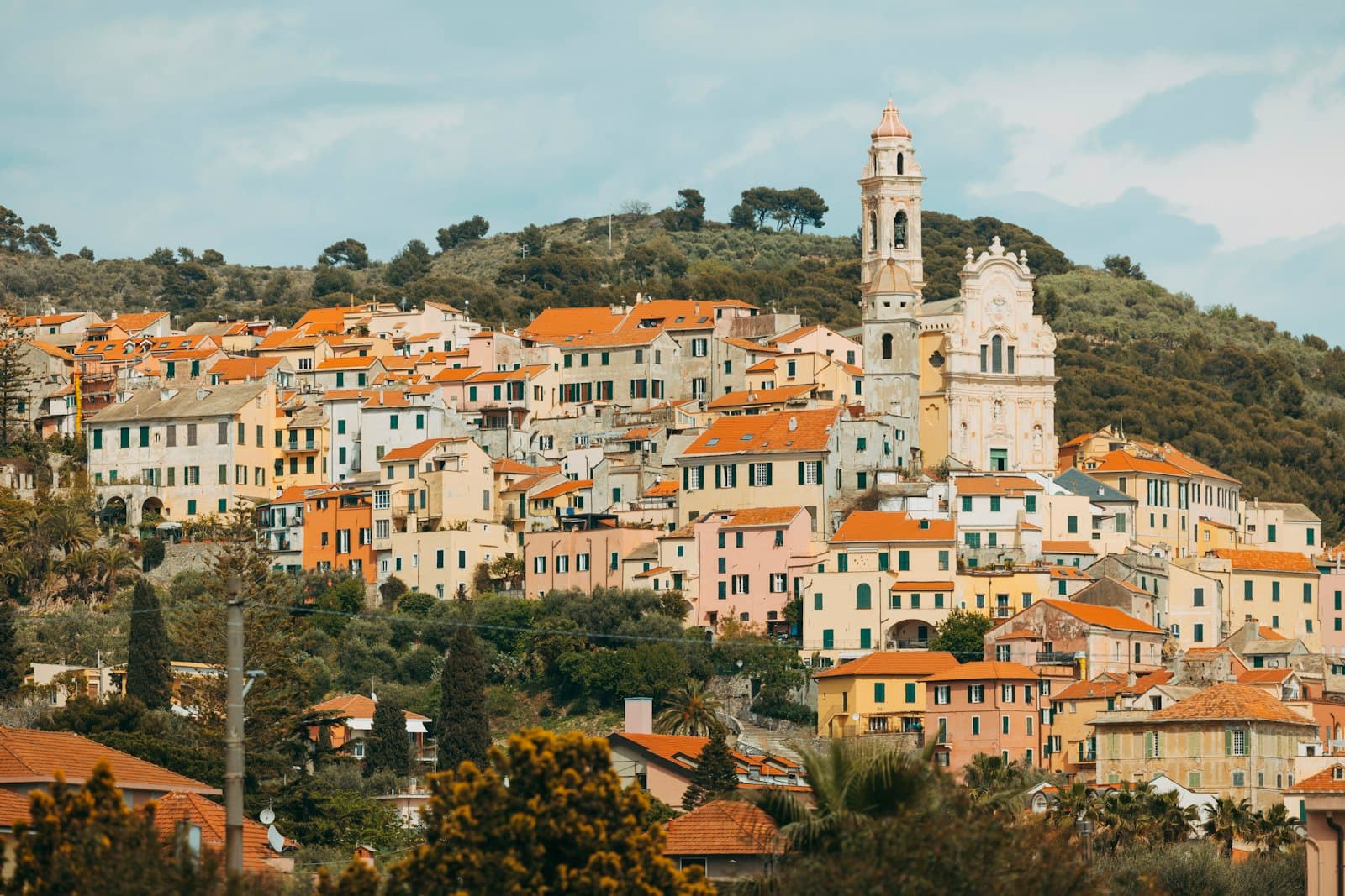 Cervo — a city with many buildings and a clock tower