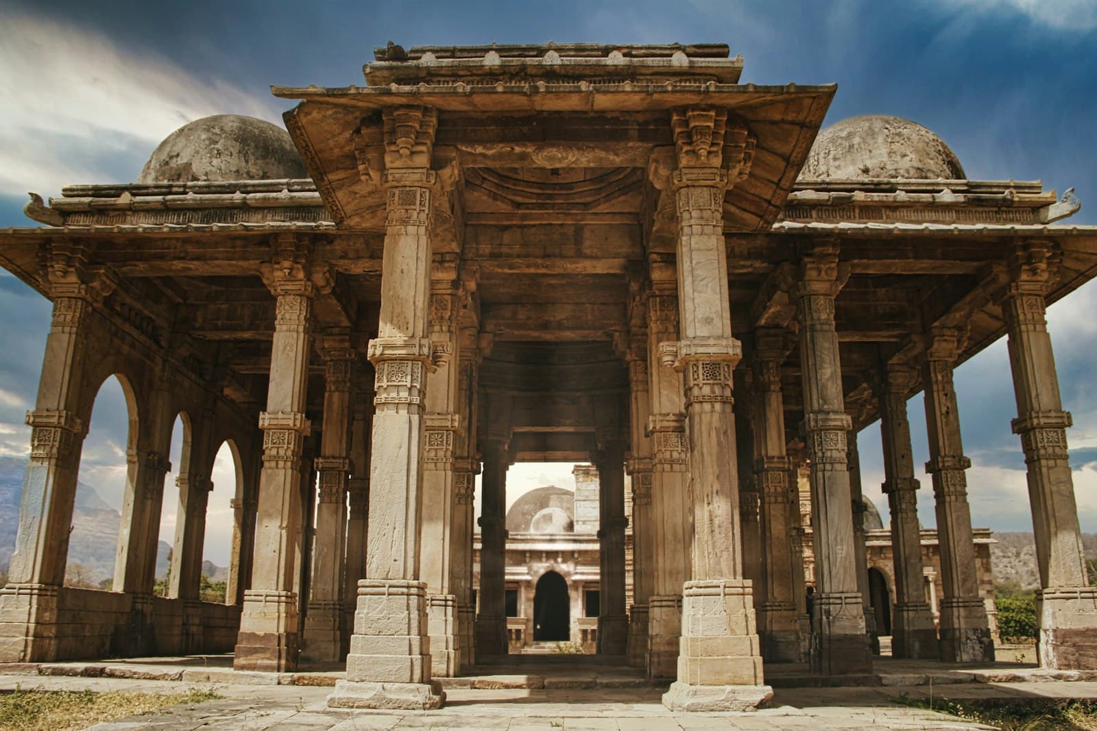 Champaner — people walking on brown concrete building during daytime