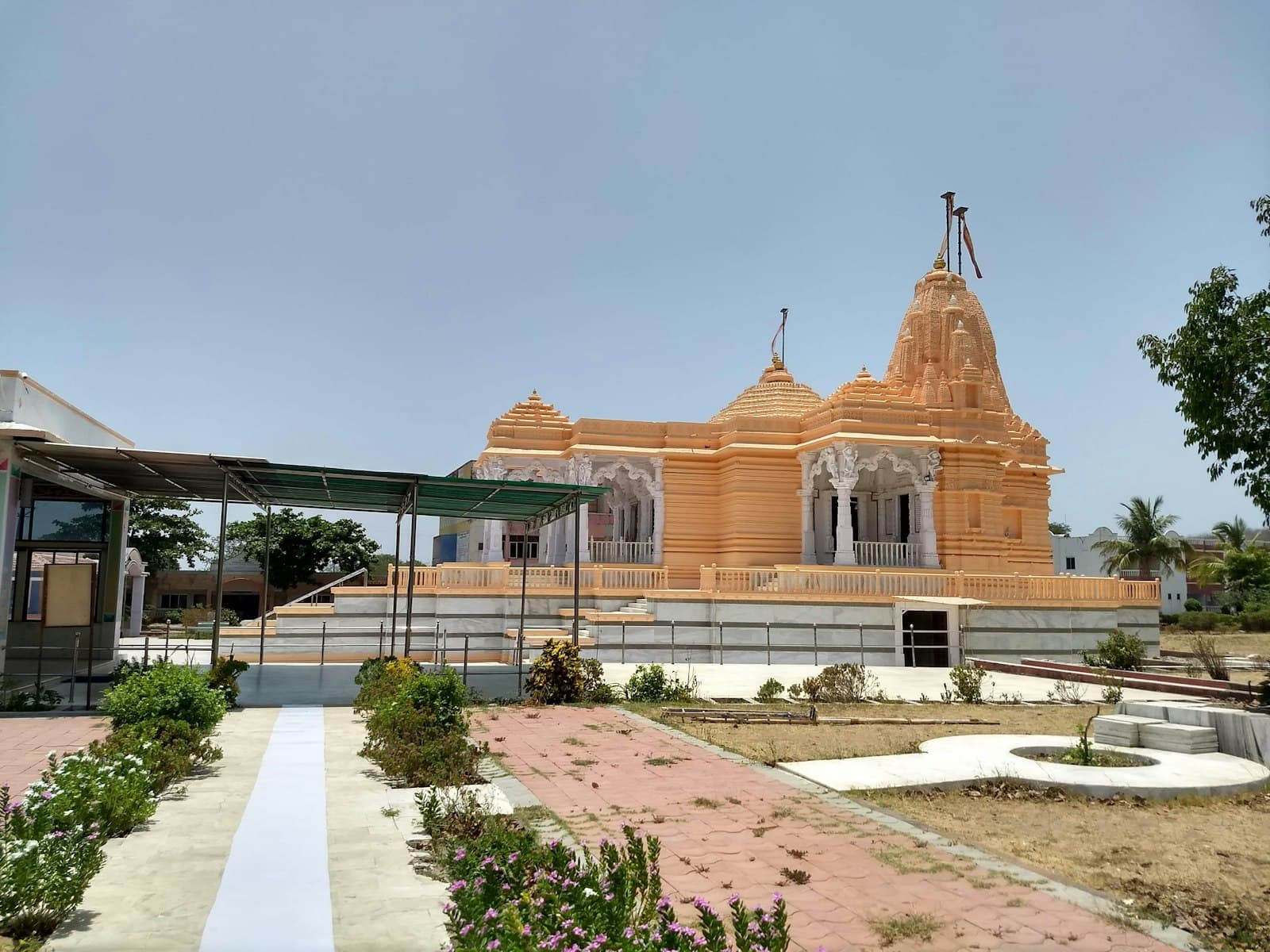 Champaner — a large wooden building with a cross on top of it