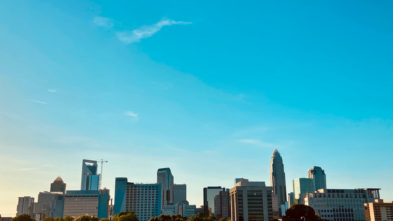 Charlotte — a city skyline with blue sky