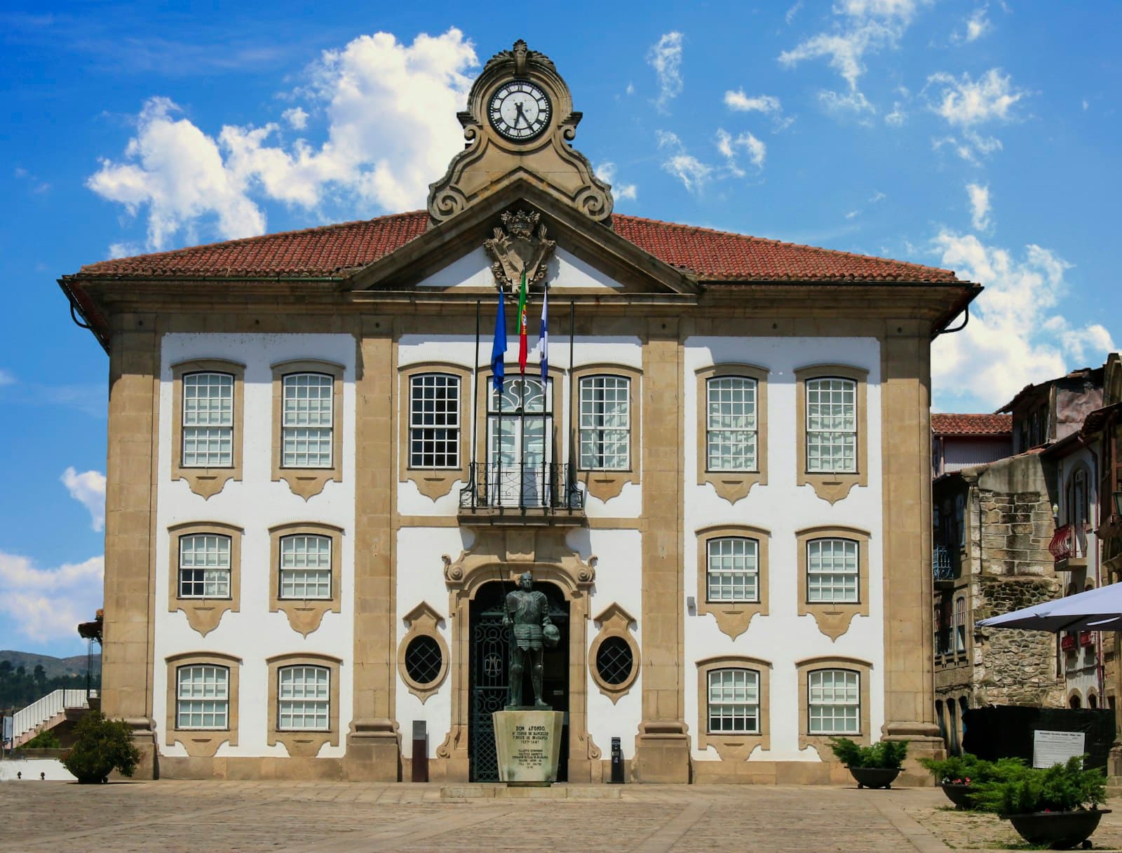 Chaves — A beautiful, ornate building with a clock on top.