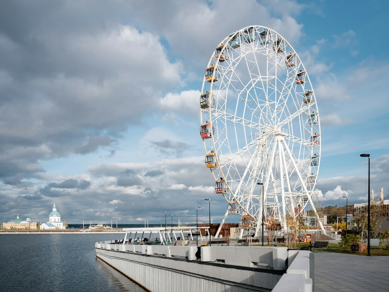 Cheboksary — a large ferris wheel sitting next to a body of water