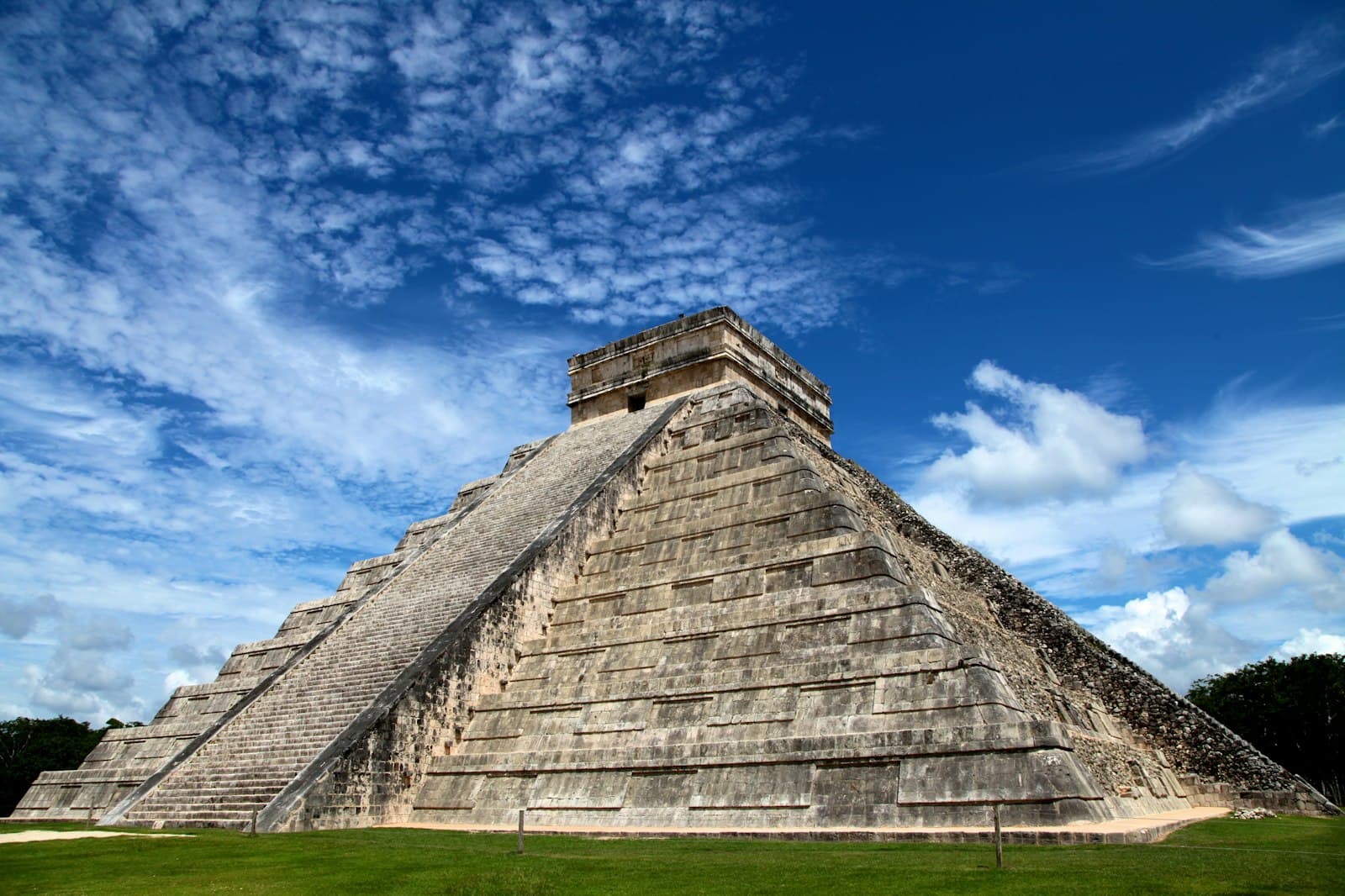 Chichen Itza — gray concrete pyramid under blue sky during daytime