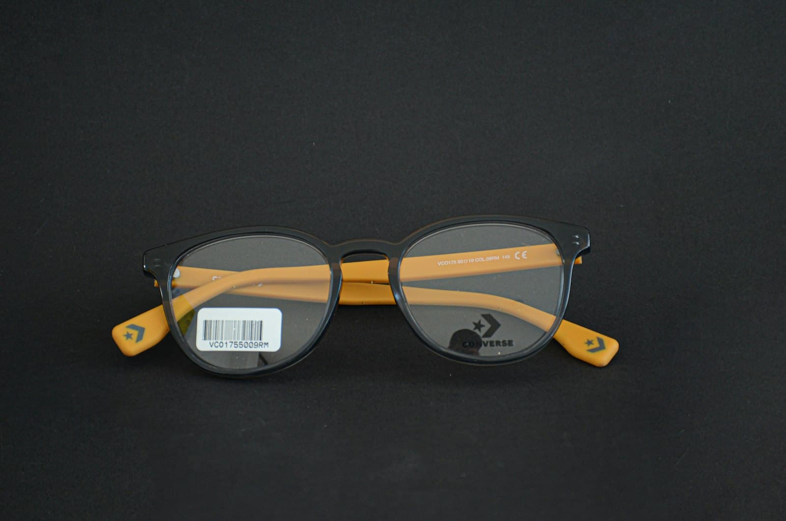 Chiclayo — black framed eyeglasses on black textile